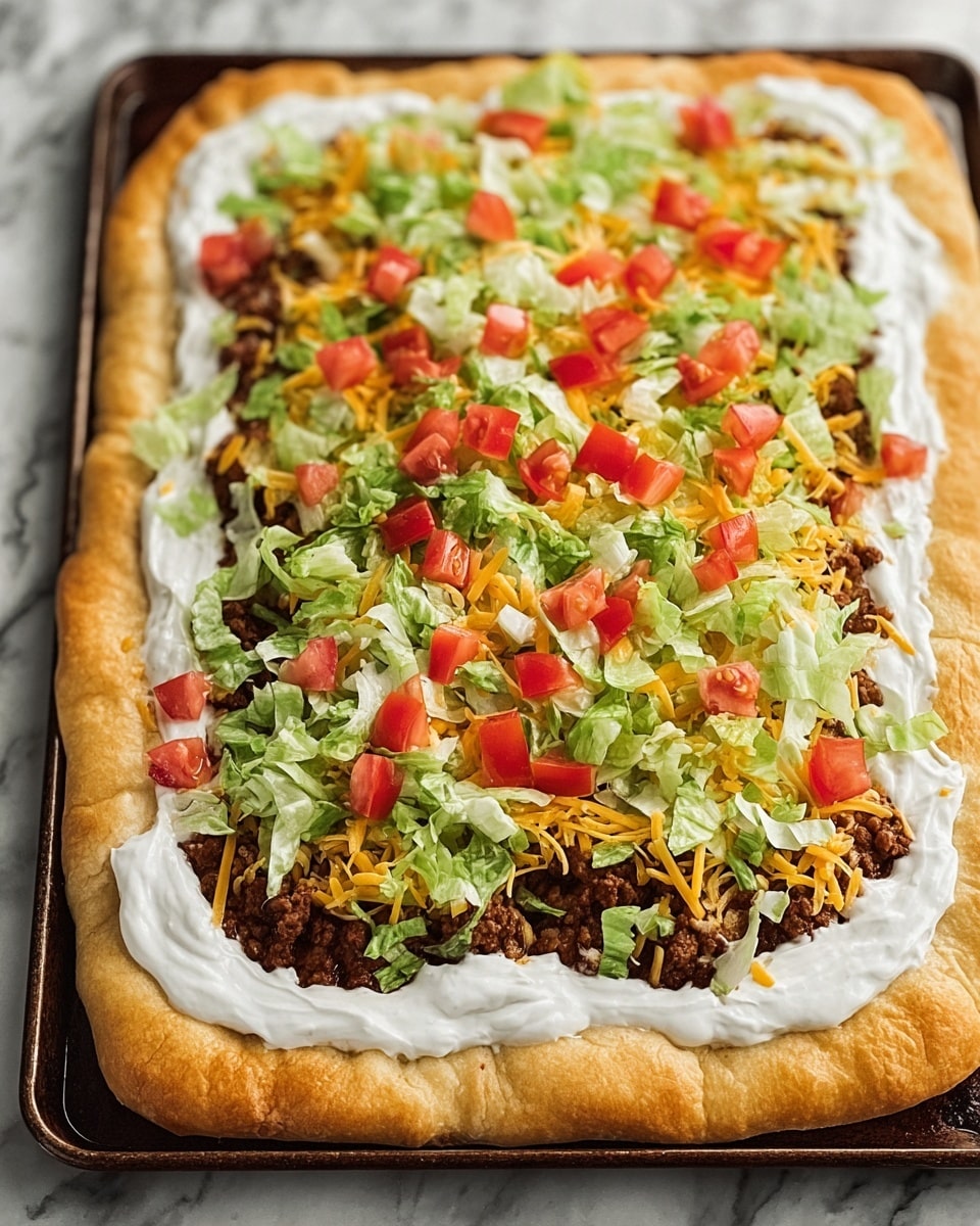 This image shows a square flatbread with five layers of toppings. The bottom layer is a golden-brown crust with a flaky texture. On top of that is a thick, smooth white creamy layer spread evenly near the edges. The third layer is crumbly ground beef, dark brown in color, spread fully over the cream. The fourth layer is shredded bright yellow cheese scattered across the beef. The last layer is a mix of chopped fresh green lettuce, diced red tomatoes, and small white onion pieces spread all over the top. The flatbread is placed on a baking tray with a white marbled surface in view. photo taken with an iphone --ar 4:5 --v 7