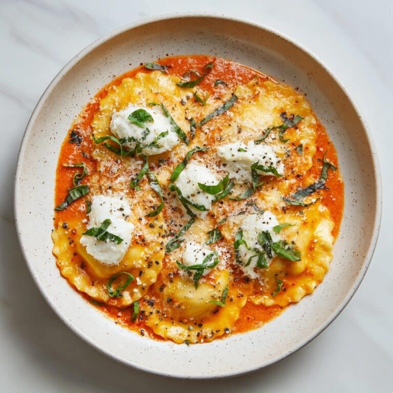 Sheet-Pan Ravioli With Burst Tomatoes Recipe